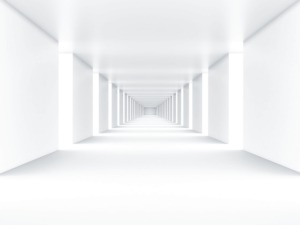 An abstract, minimalist illustration of a long corridor with a series of evenly spaced, square-shaped columns and arches creating a vanishing point perspective. The entire scene is rendered in a monochromatic white, giving it a clean, sterile appearance that evokes the precision and orderliness associated with enterprise compliance. The repetitive structure suggests a systematic approach to regulations and standards in a corporate setting.