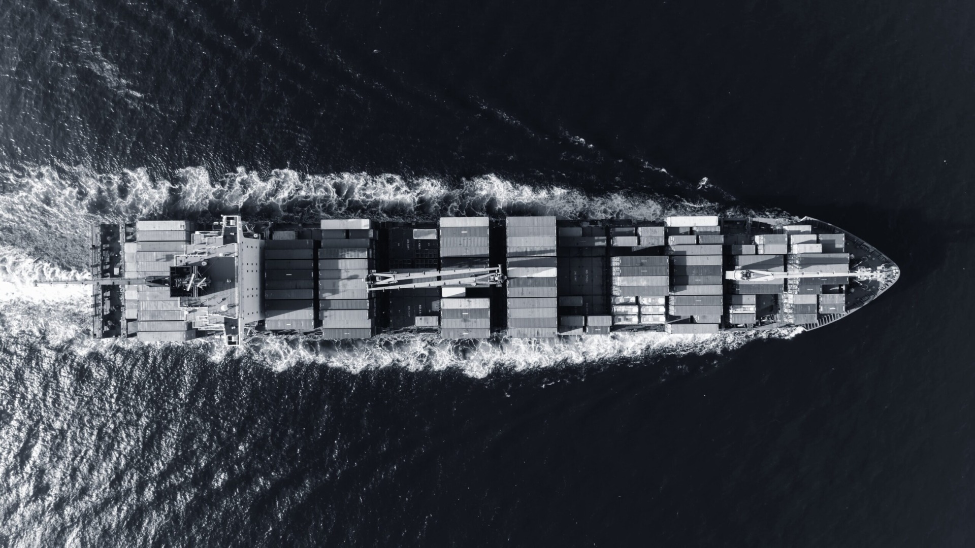 Image of a cargo ship transport goods in the open ocean